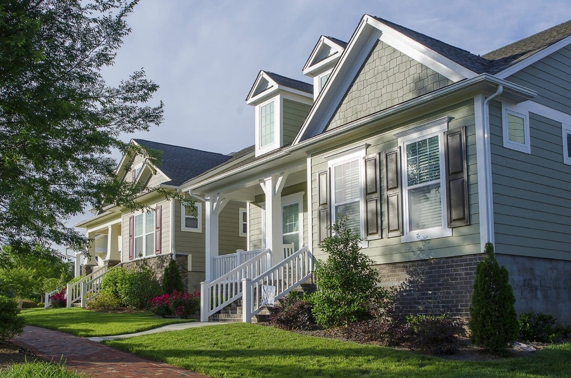 green-siding-house